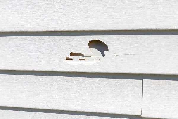 White Vinyl Siding Repair in Denton